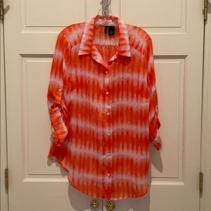 Fun orange tie dyed button up top.